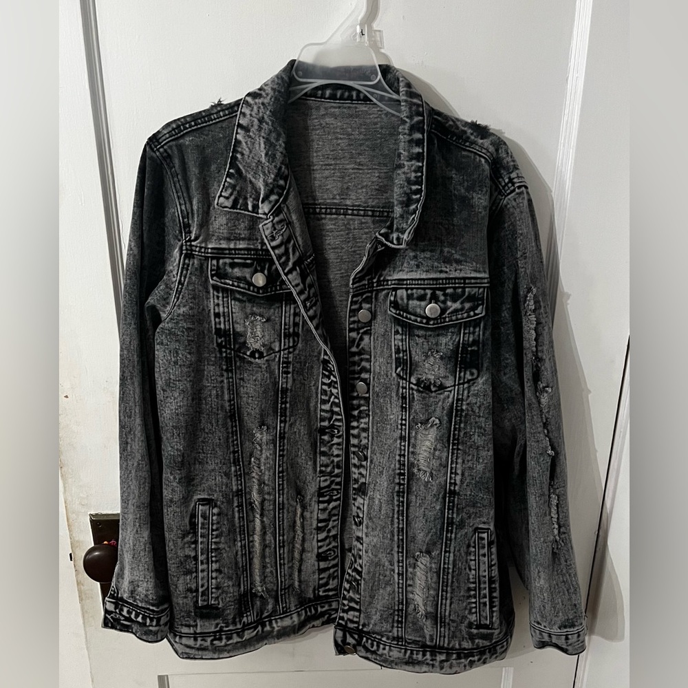Distressed denim jacket